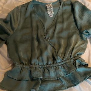 It’s a green blouse